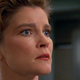 Kate Mulgrew, looking shocked as Captain Kathryn Janeway in Star Trek: Voyager
